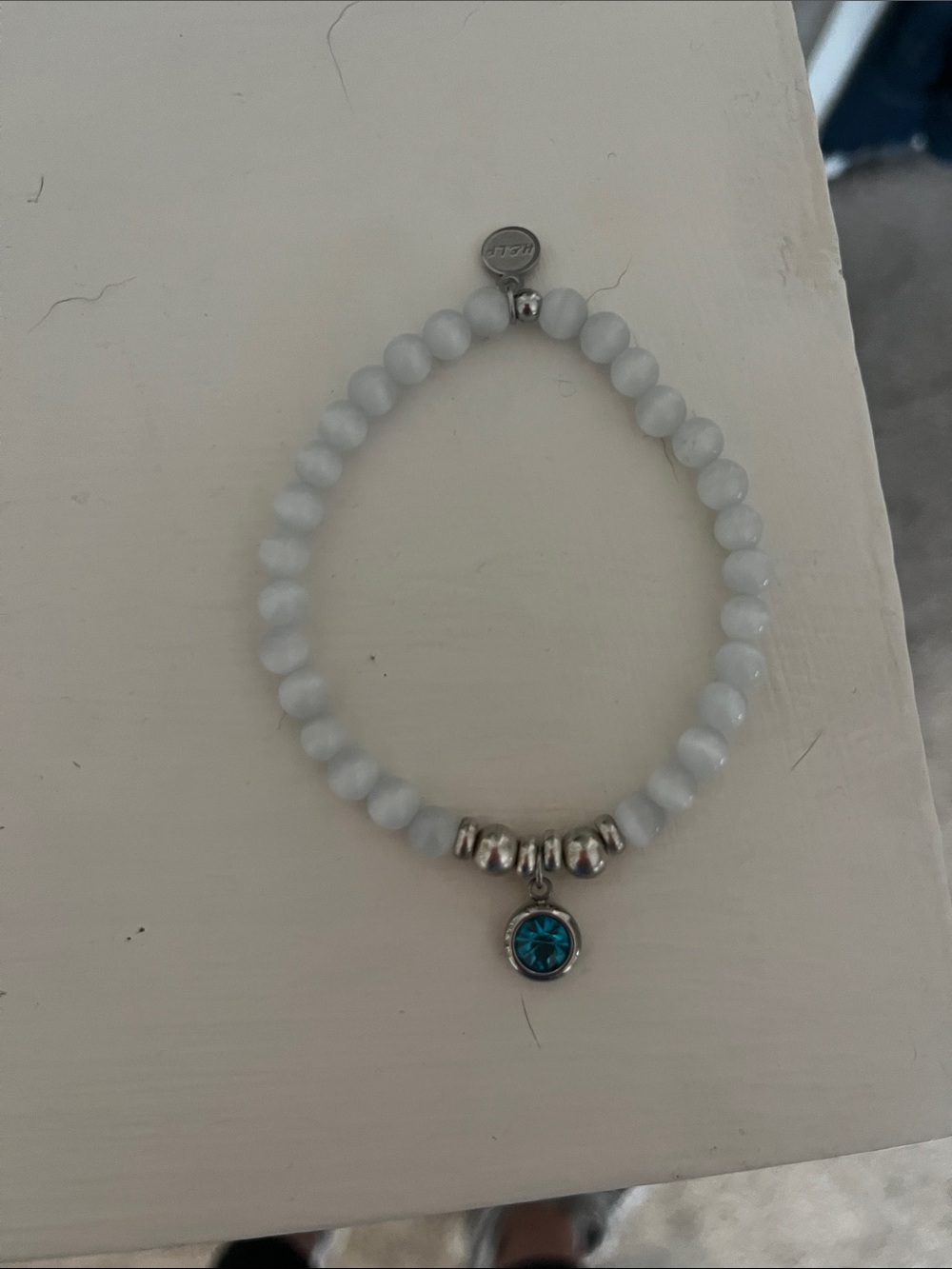 White Beaded Bracelet with aquamarine  Blue Charm - march birthstone